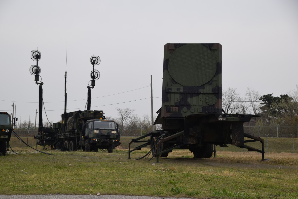 AN/MPQ-65 PATRIOT radar set and antenna mast group positioned in a field